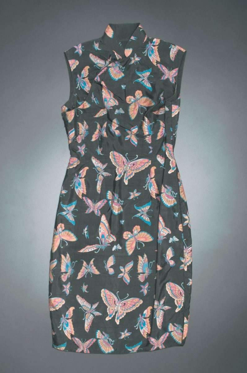 Black cheongsam printed with butterflies with matching beige jacket
