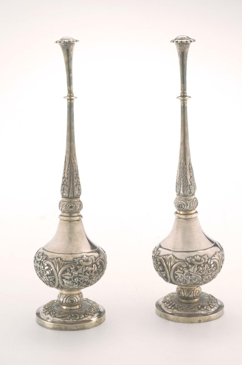 A pair of rose water sprinklers