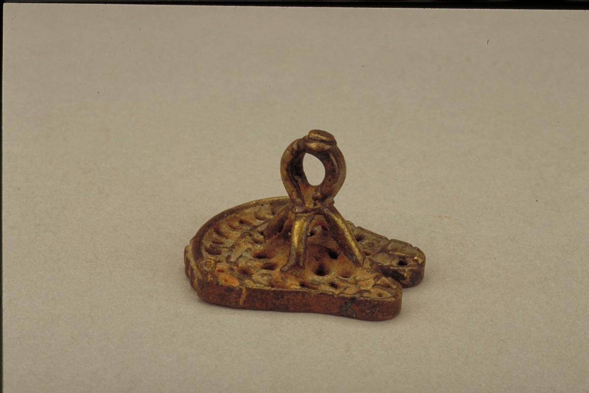 Branding stamp depicting Vishnu's feet