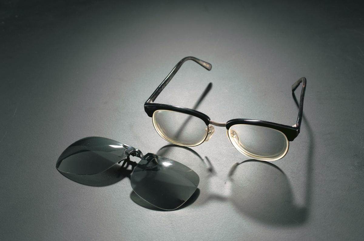 Spectacles with clip-on shades that belonged to the late Mr Lim Kim San