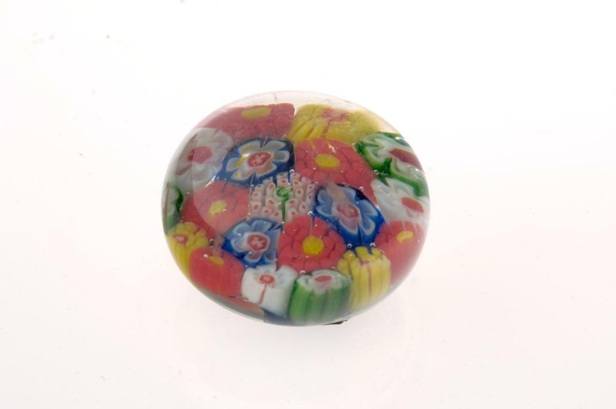 Glass paperweight with floral design
