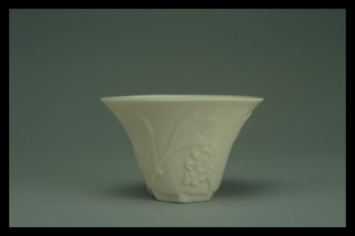 Cup with relief of peony spray
