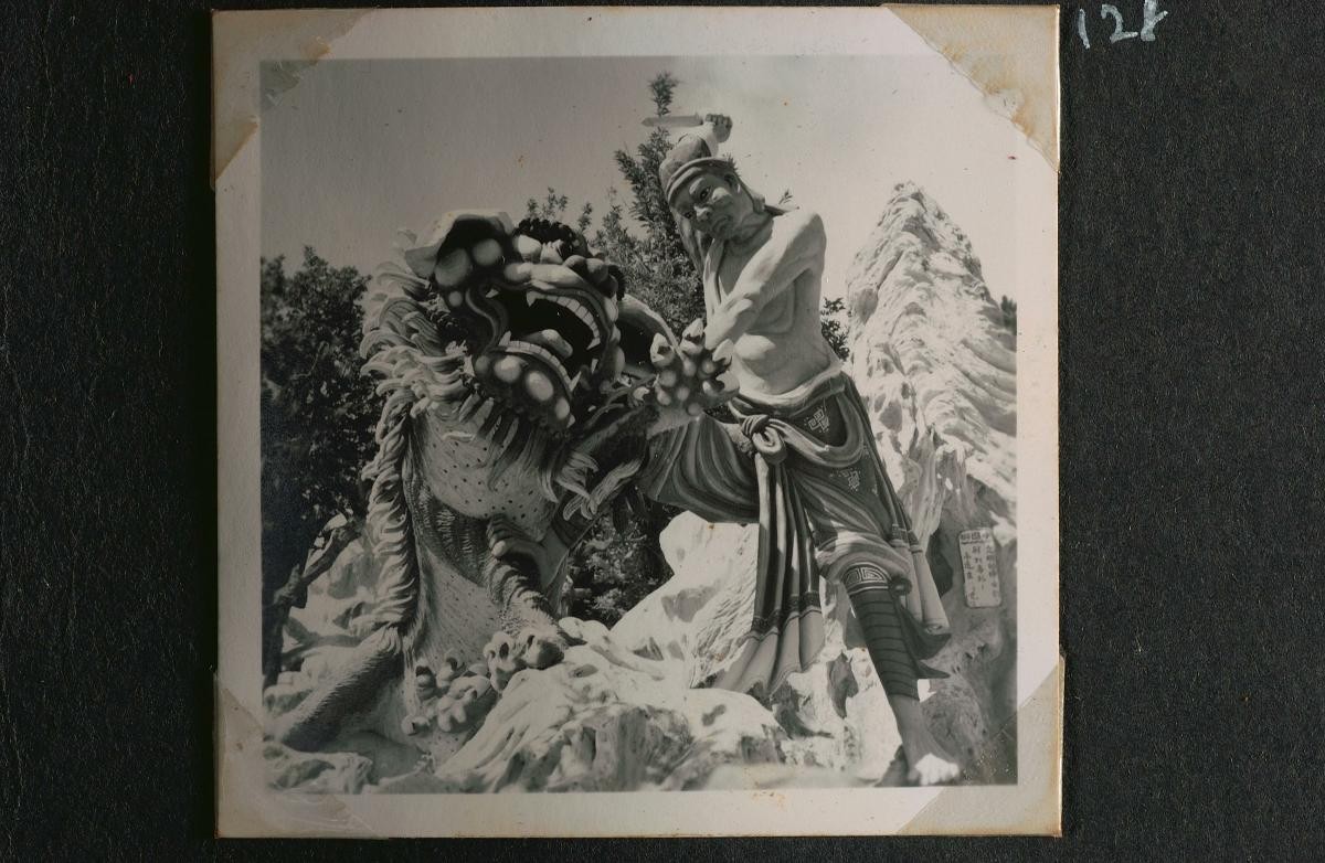 Haw Par Villa exhibit of a man fighting a mythical creature