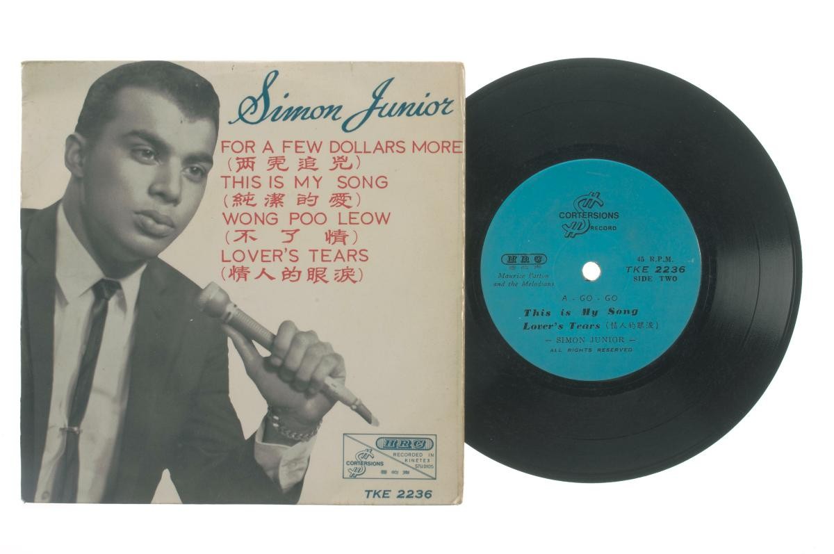 Vinyl record ‘Songs by Simon Junior’ accompanied by live band The Melodians, TKE-2236