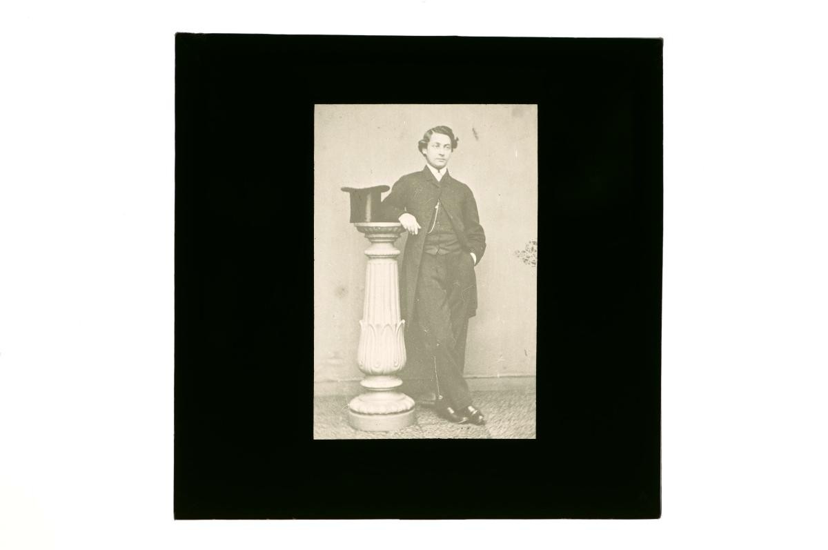 A glass lantern slide depicting a European man