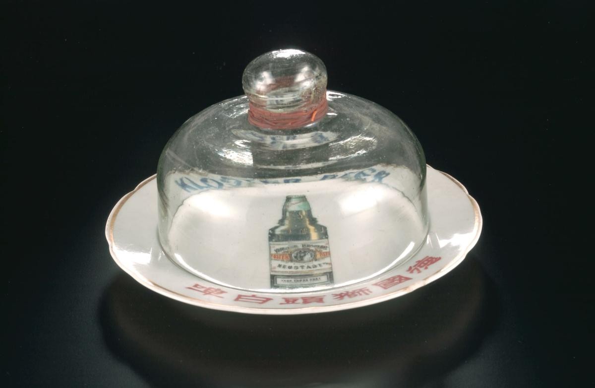 Glass cover and plate featuring Kloster beer