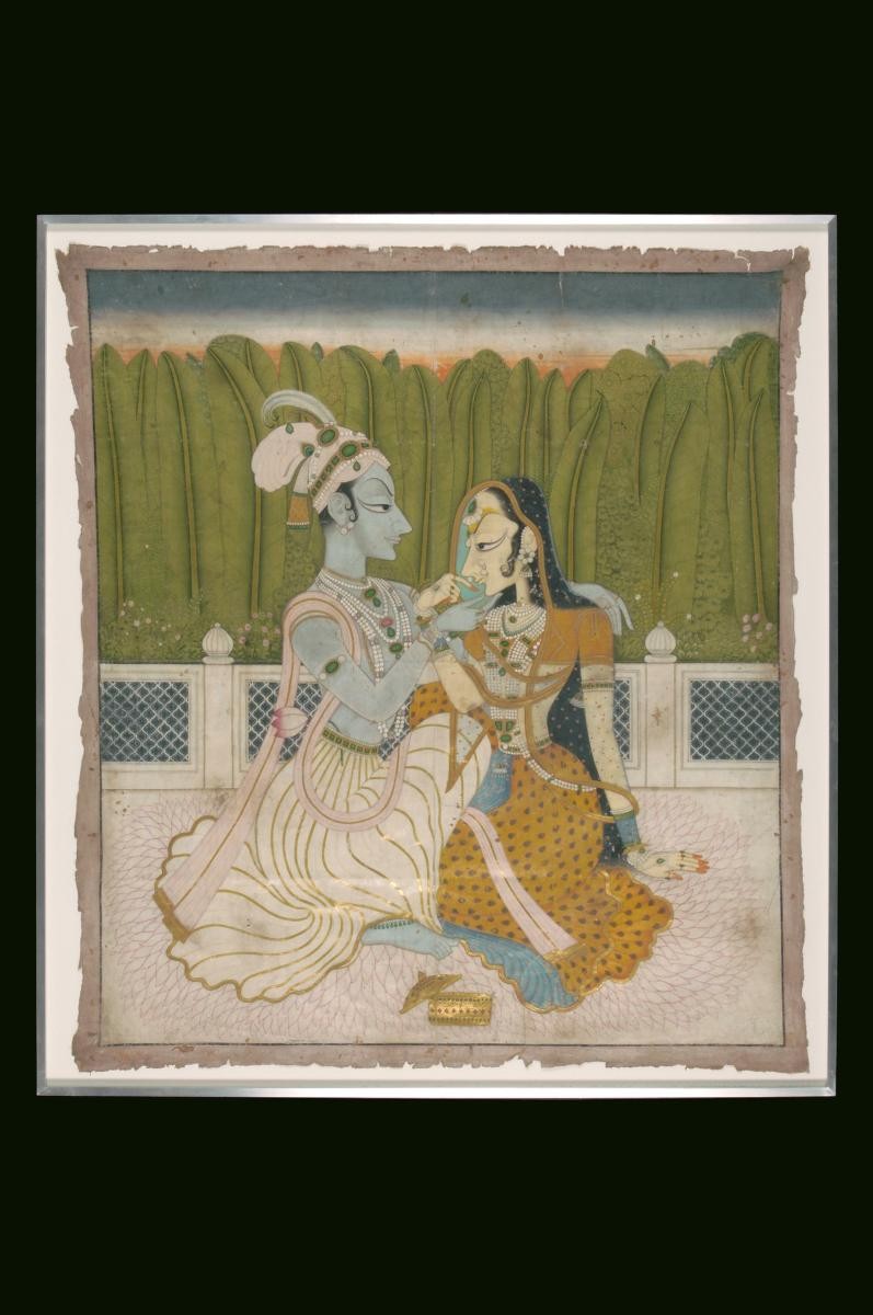 A painting of Radha and Krishna on a terrace