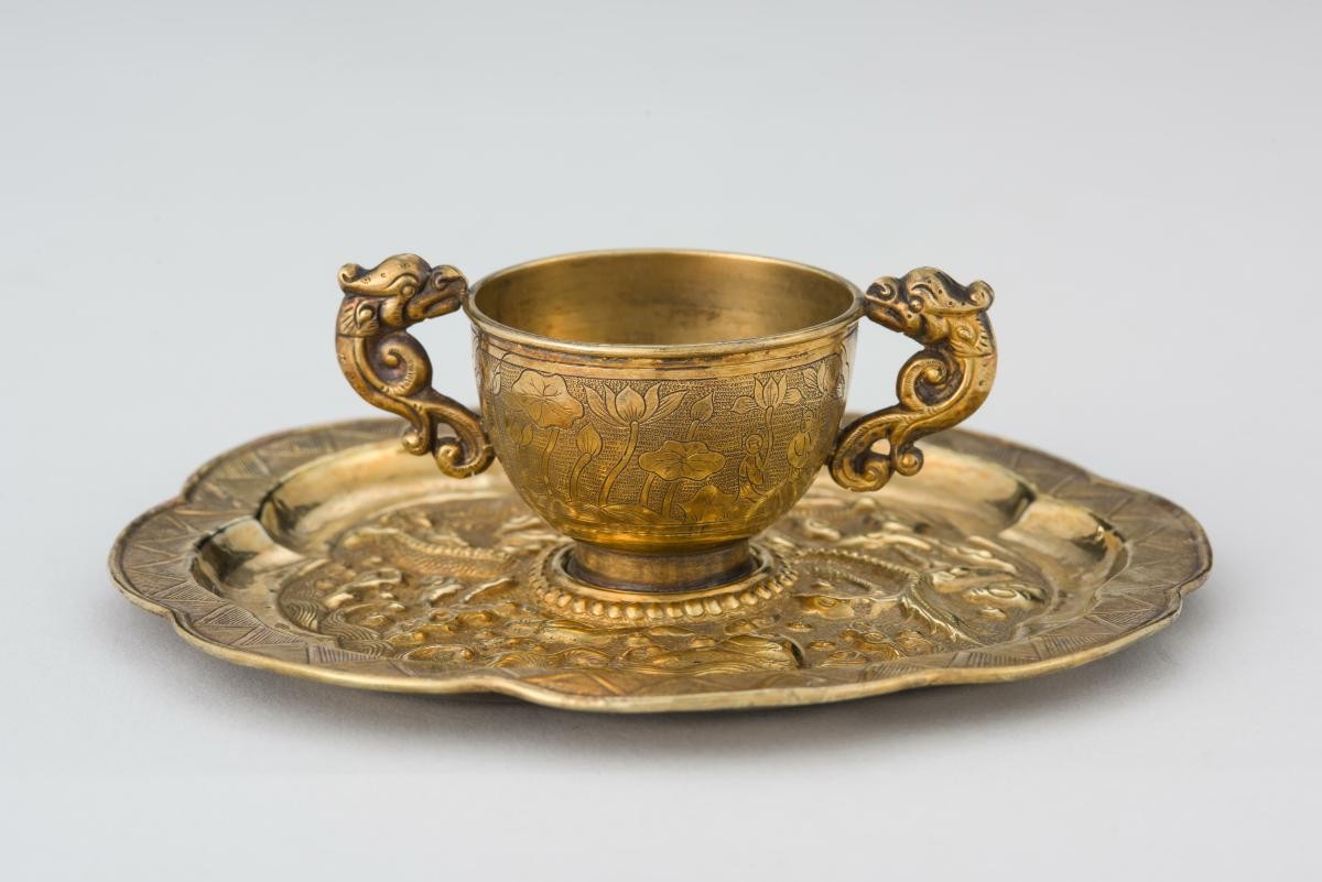 Cup with saucer