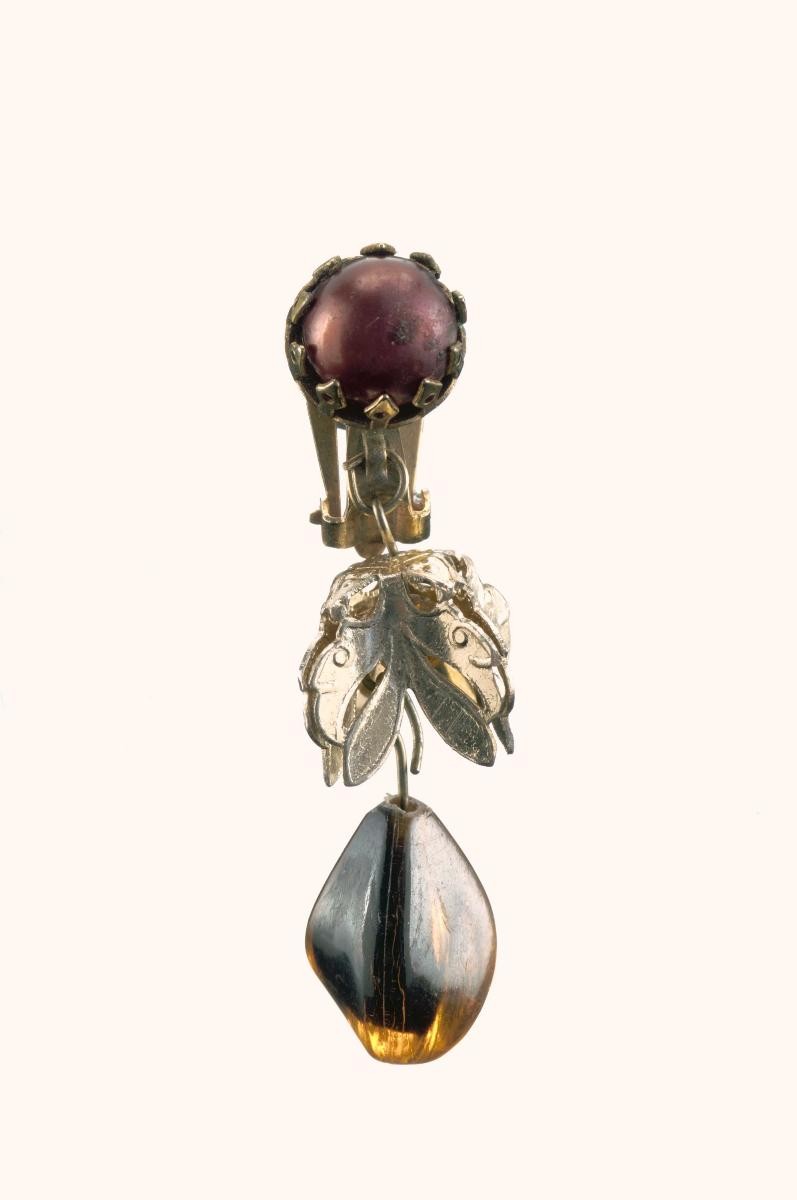 A pair of ear rings with pearls and crystals that belonged to a notable women's rights activist
