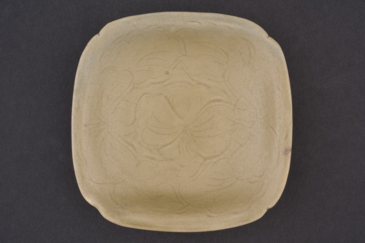 Square dish with incised floral medallion