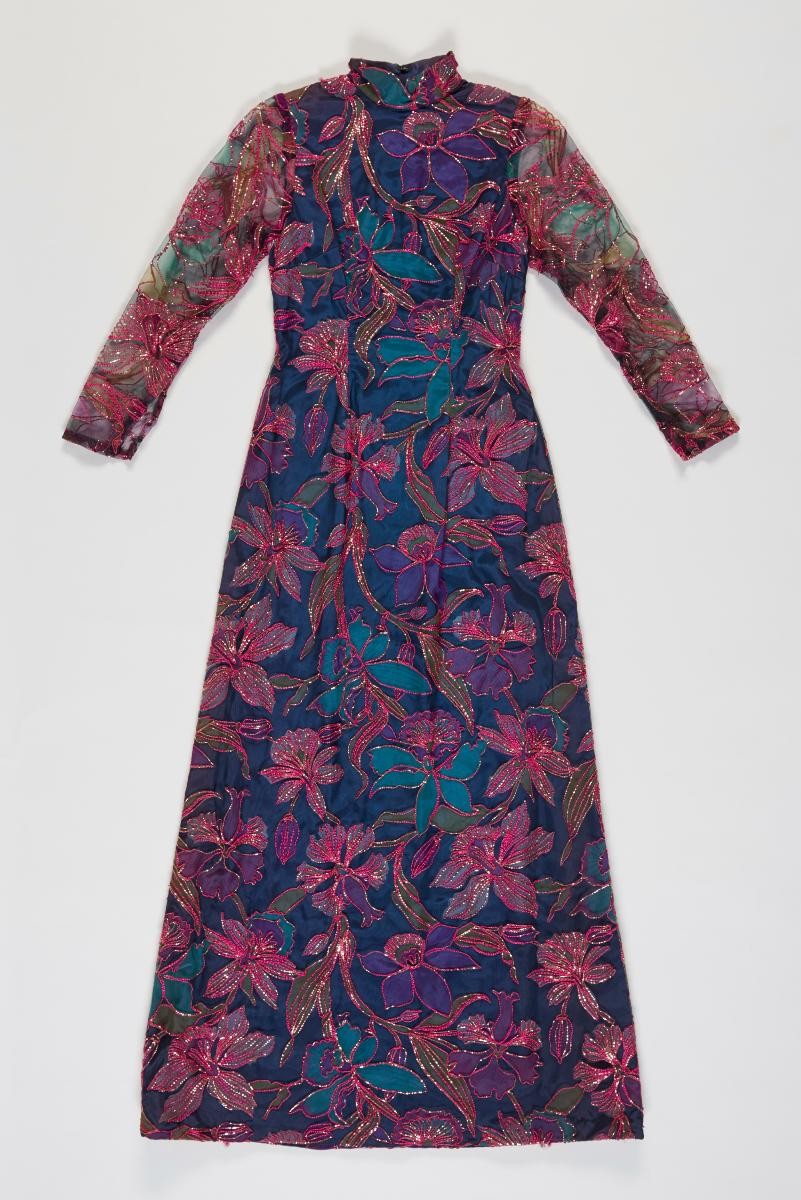 Purple dress with embroidered floral motifs in gold threading by Sylvia Kho nee Wong Sien Moy