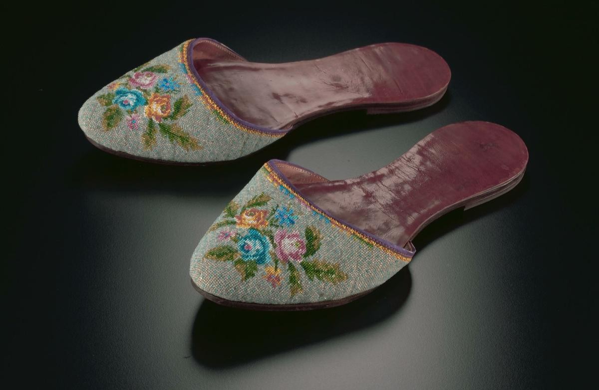 A pair of beaded slippers