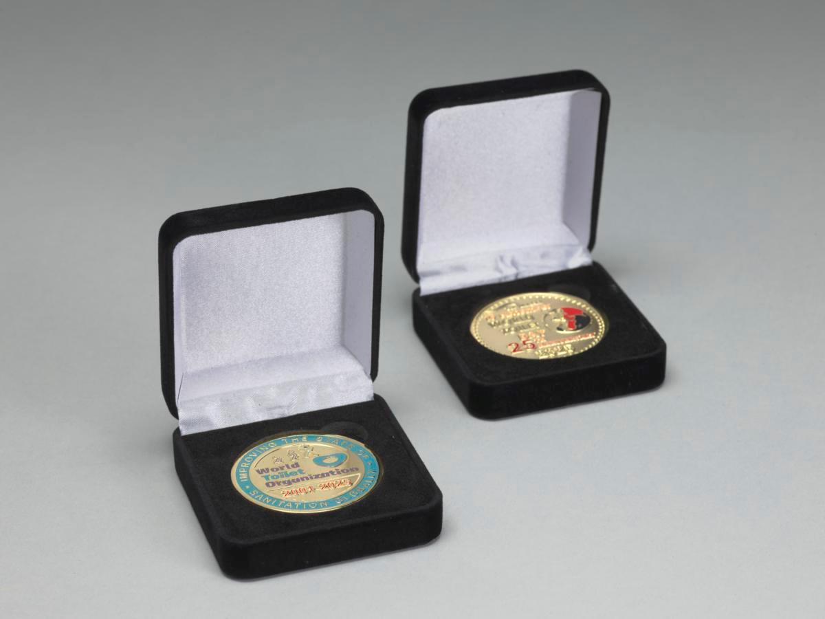 Coin commemorating the World Toilet Organization’s 25th anniversary