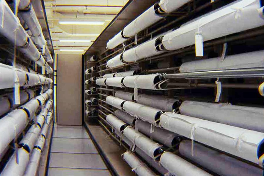 <p style="color: #000000; margin: 0cm 0cm 8pt;"><span>Flat textiles (textiles with no embroidery or decorations sewn on) are rolled on rollers and protected with Tyvek paper. These textiles are kept in the Textile Store with identification tags attached.</span>