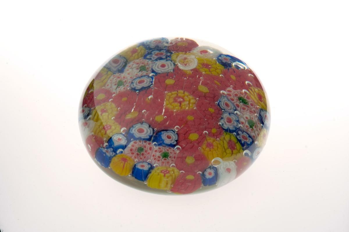 Glass paperweight with floral design