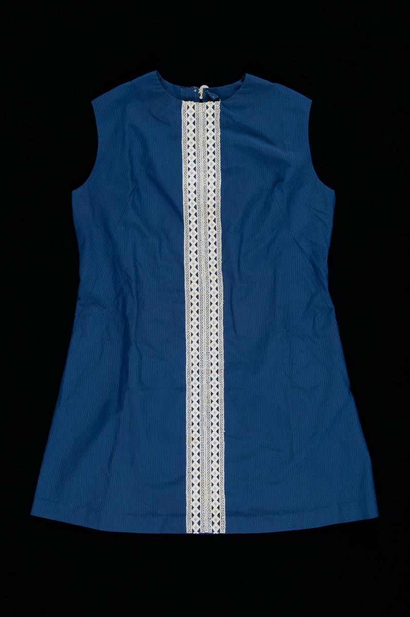 Blue sleeveless dress with white lace panel