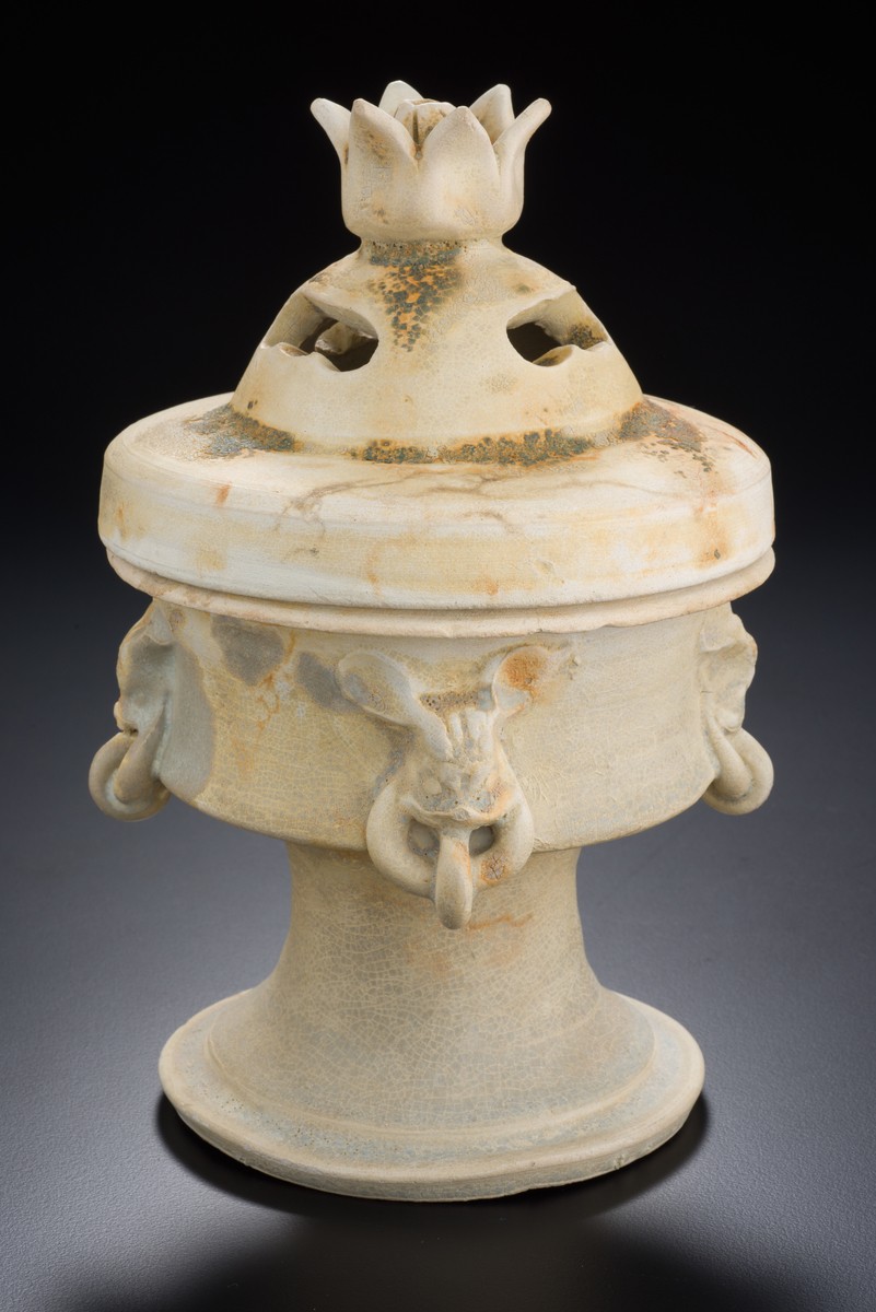 Incense burner with floral finial on lid