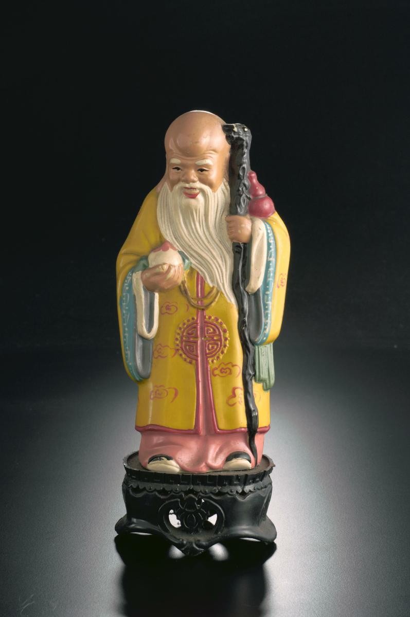 Plastic Fu Lu Shou figurine coin bank by OCBC bank