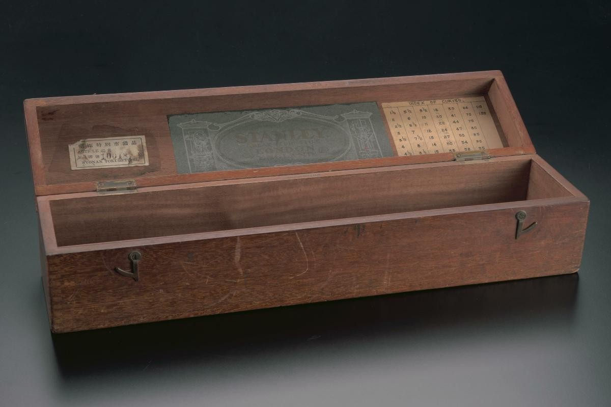 Box containing a set of 48 Stanley drafting rulers