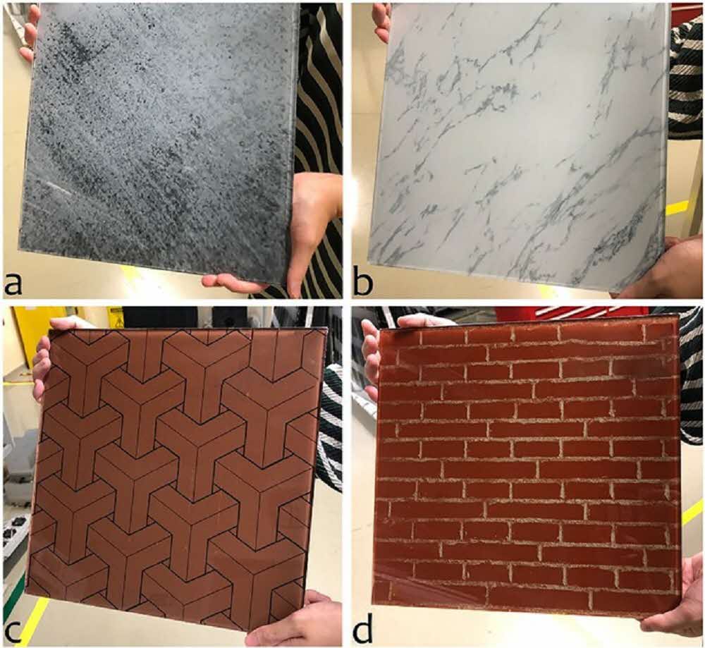 Various SERIS-Hybrid colored PV modules with patterns mimicking building materials. Photo courtesy of NUS SERIS.