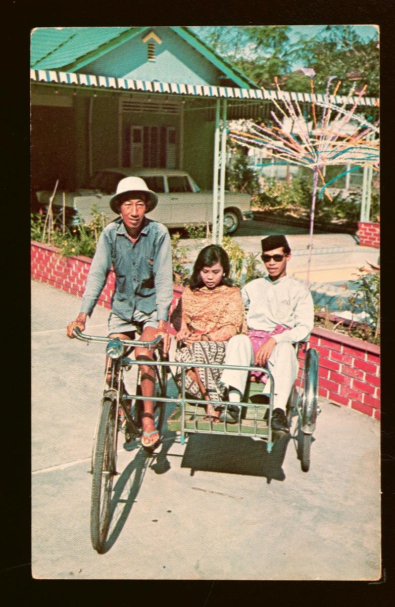 A couple on a trishaw ride