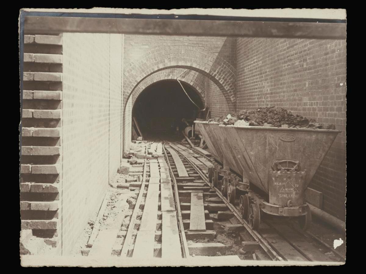 A group of 16 photographs showing the construction of the Kallang River Reservoir