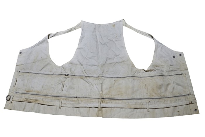 <span>This is a photograph of the specially-made vest worn by founder Ho Yew Ping during World War II, which contains multiple pockets for Ho to store and carry his gold with him while on the run.</span>