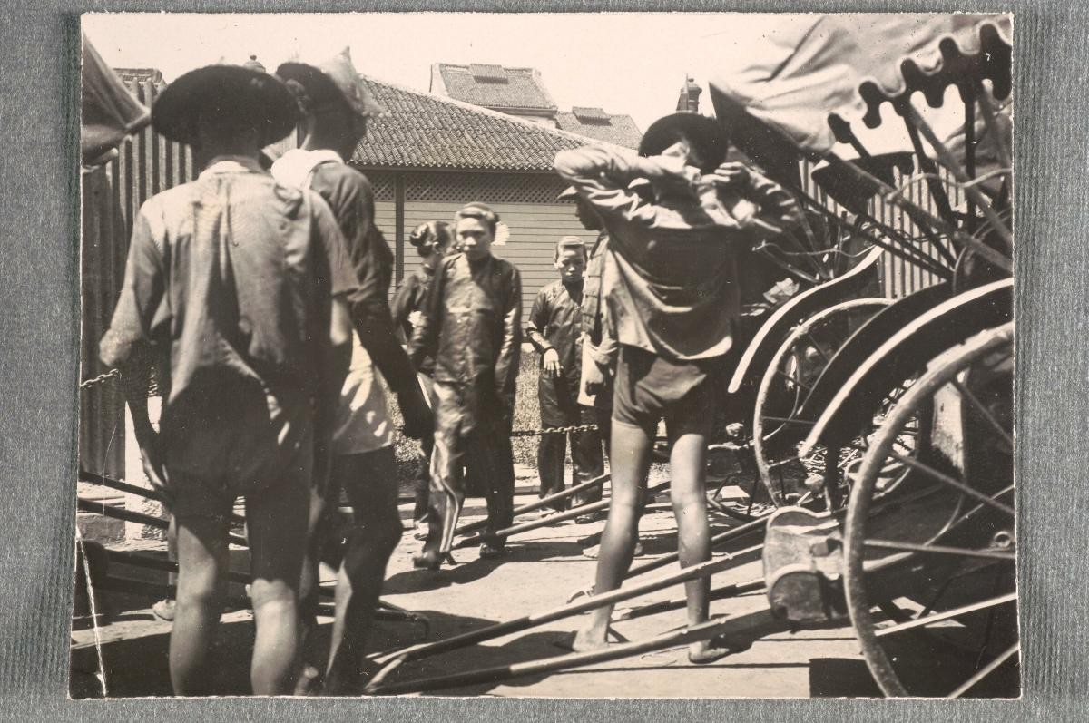 Rickshaw pullers waiting for customers