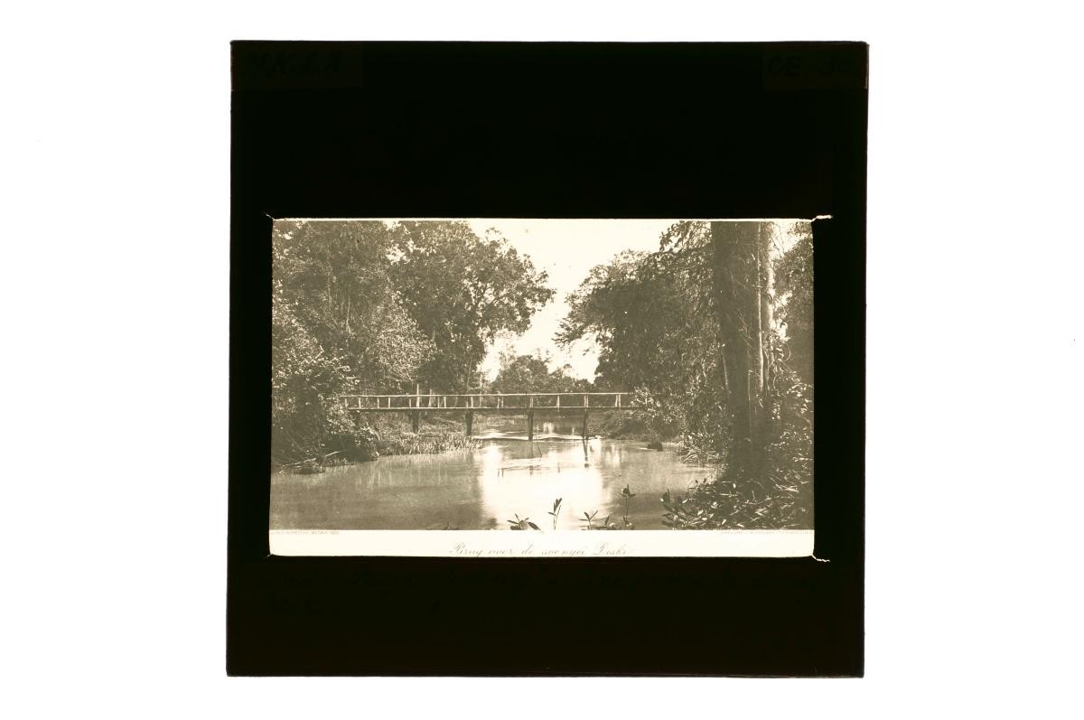 A glass lantern slide depicting a river scene