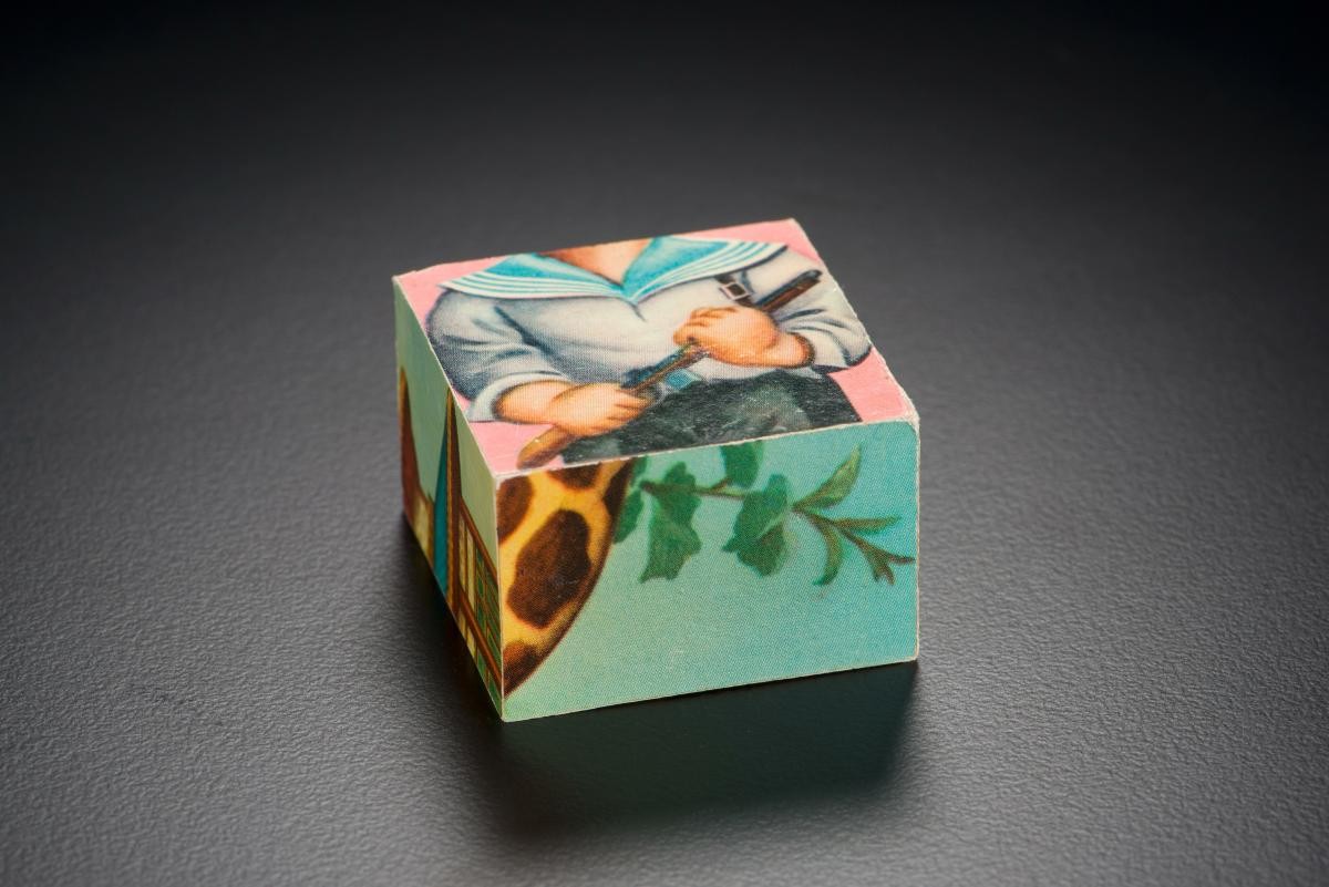 Wooden "multi-form" cube toy