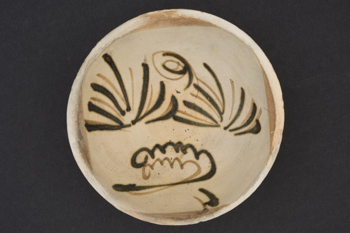 Bowl with foliage and clouds