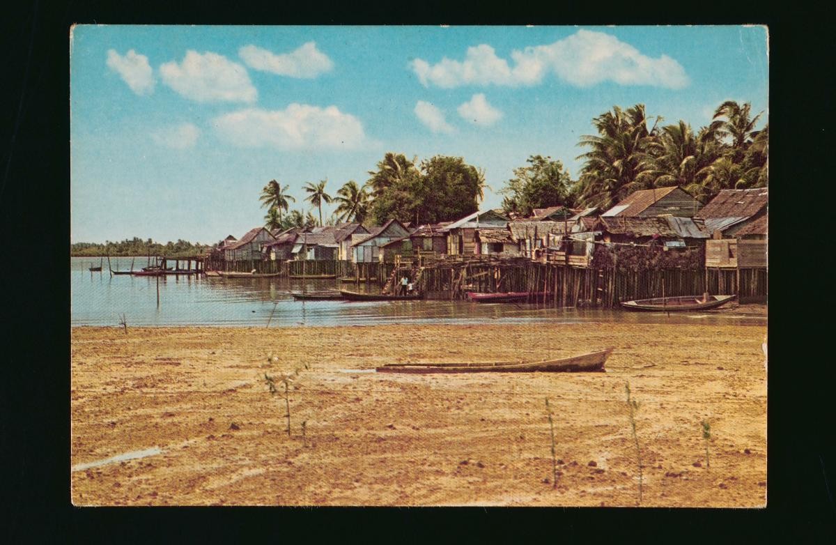 Malay attap houses in a water village at the Southern Islands