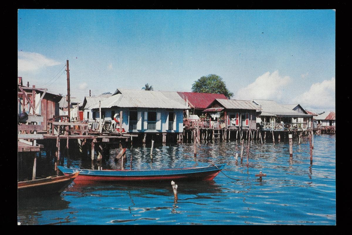 Postcard depicting houses on stilts