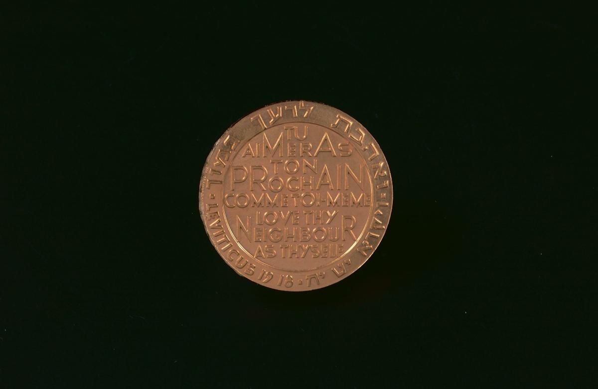 Medal with the inscription "Love Thy Neighbour"