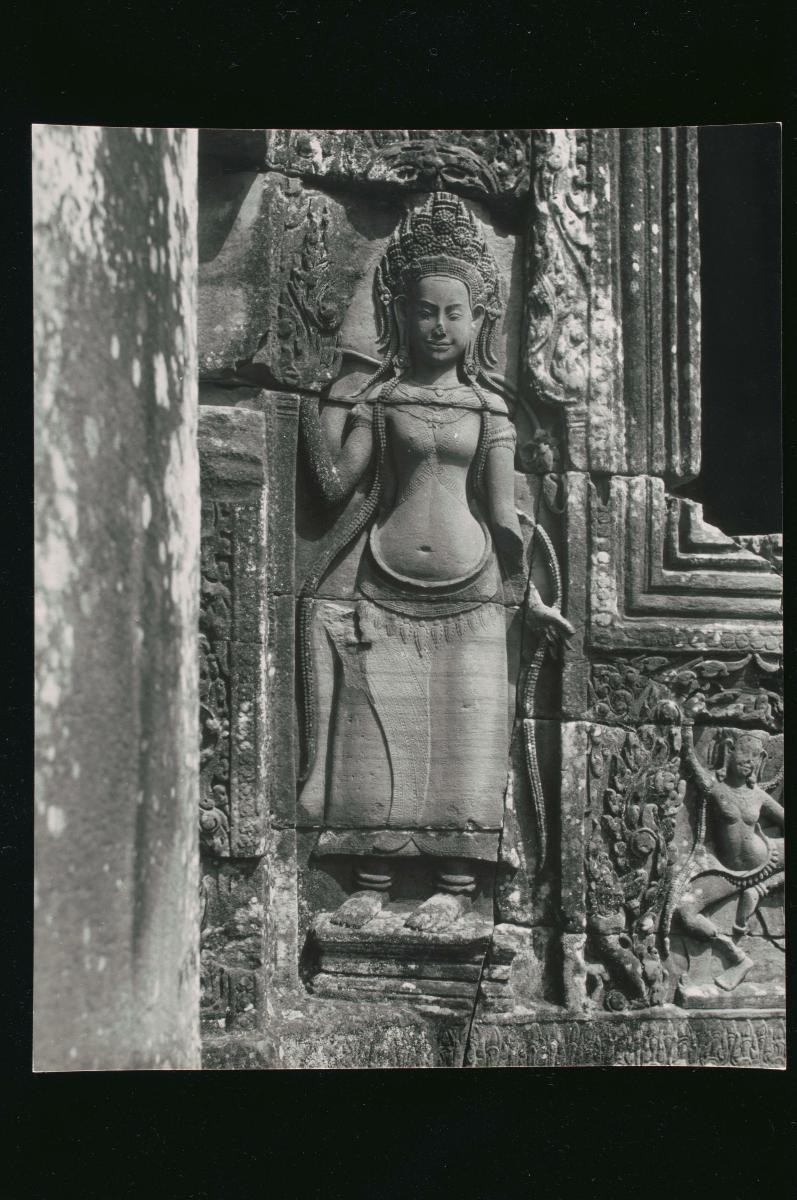 A view of a temple relief in Angkor by Loke Wan Tho