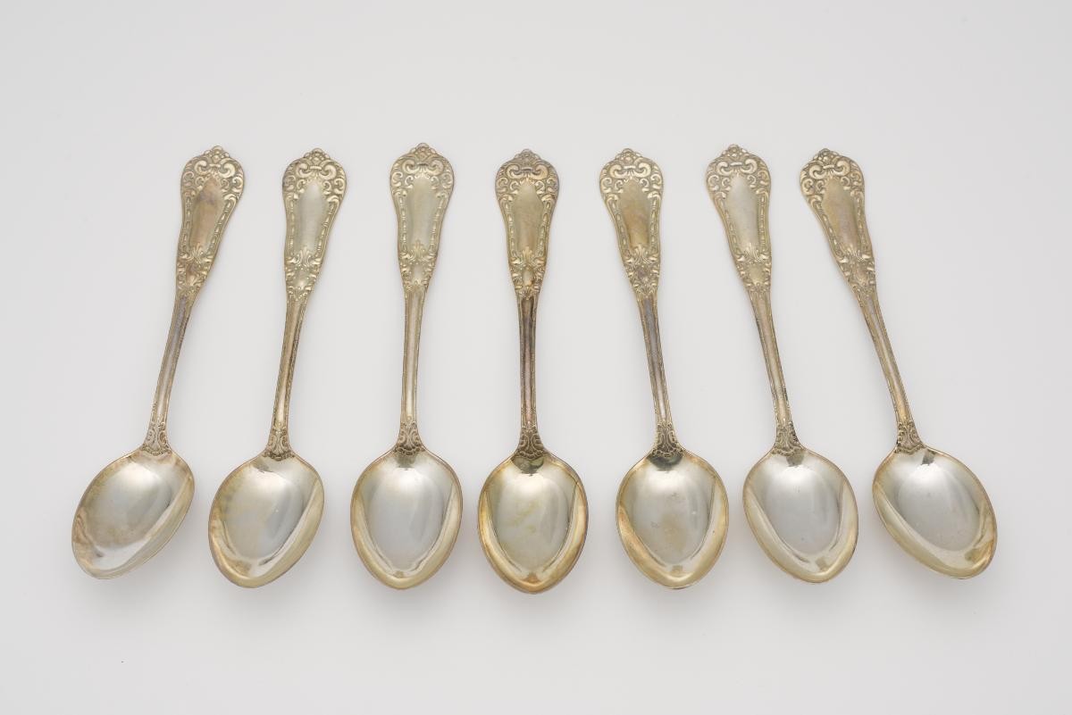 7 teaspoons belonging to Canon Roy Yin