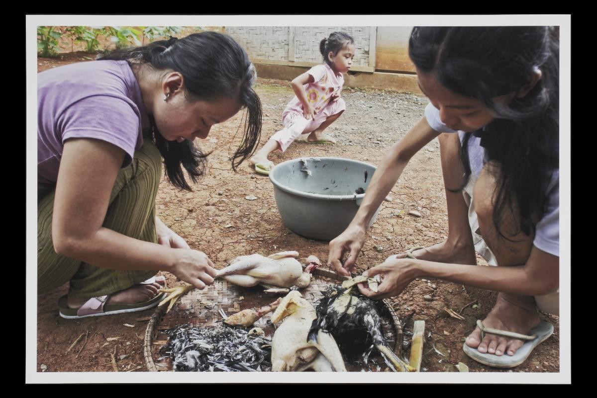 Photograph of Indonesian domestic helper Sri Indarsih Darsan back home in her village in Yogyakarta, Indonesia