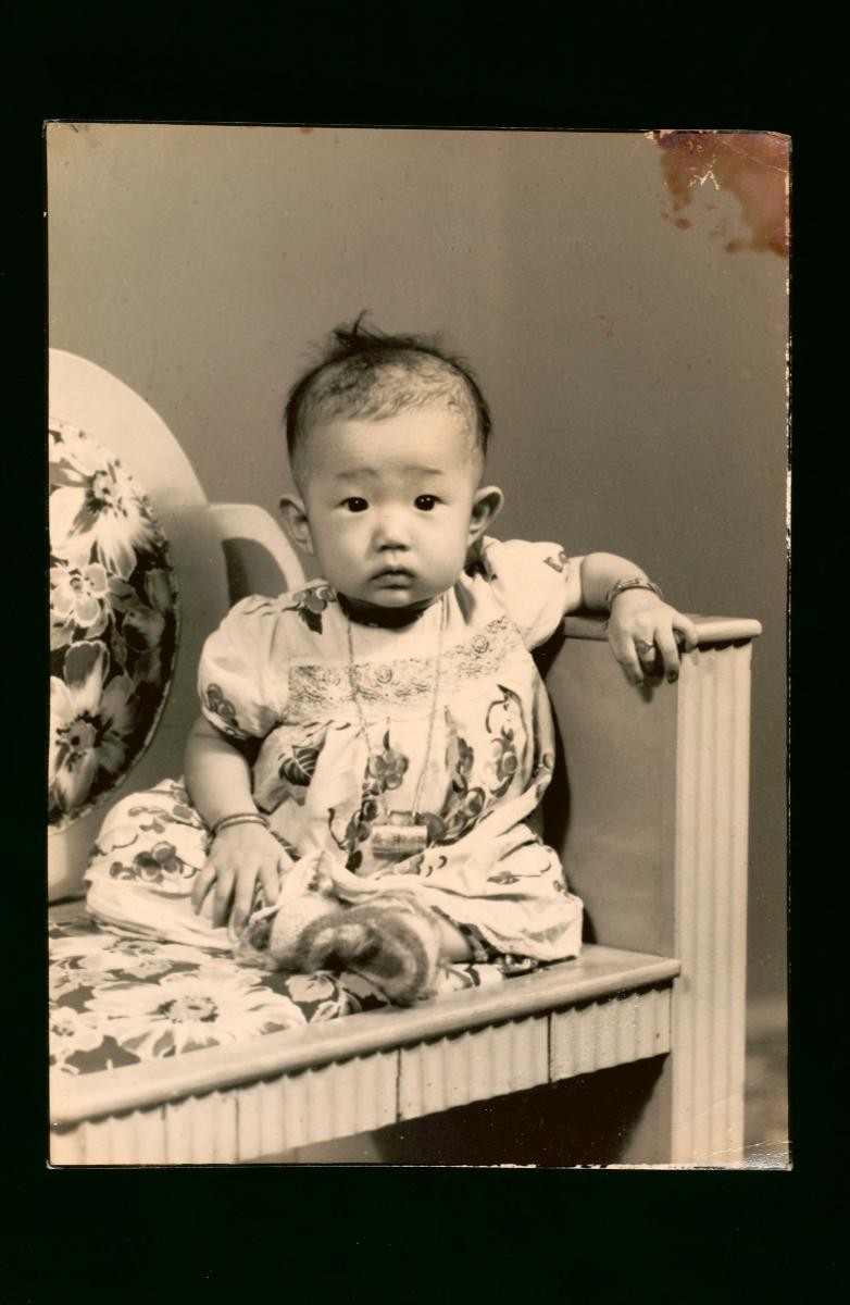 Studio portrait of a Chinese baby girl
