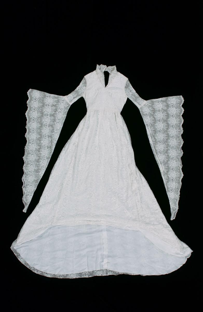 Bridal gown with long bell sleeves