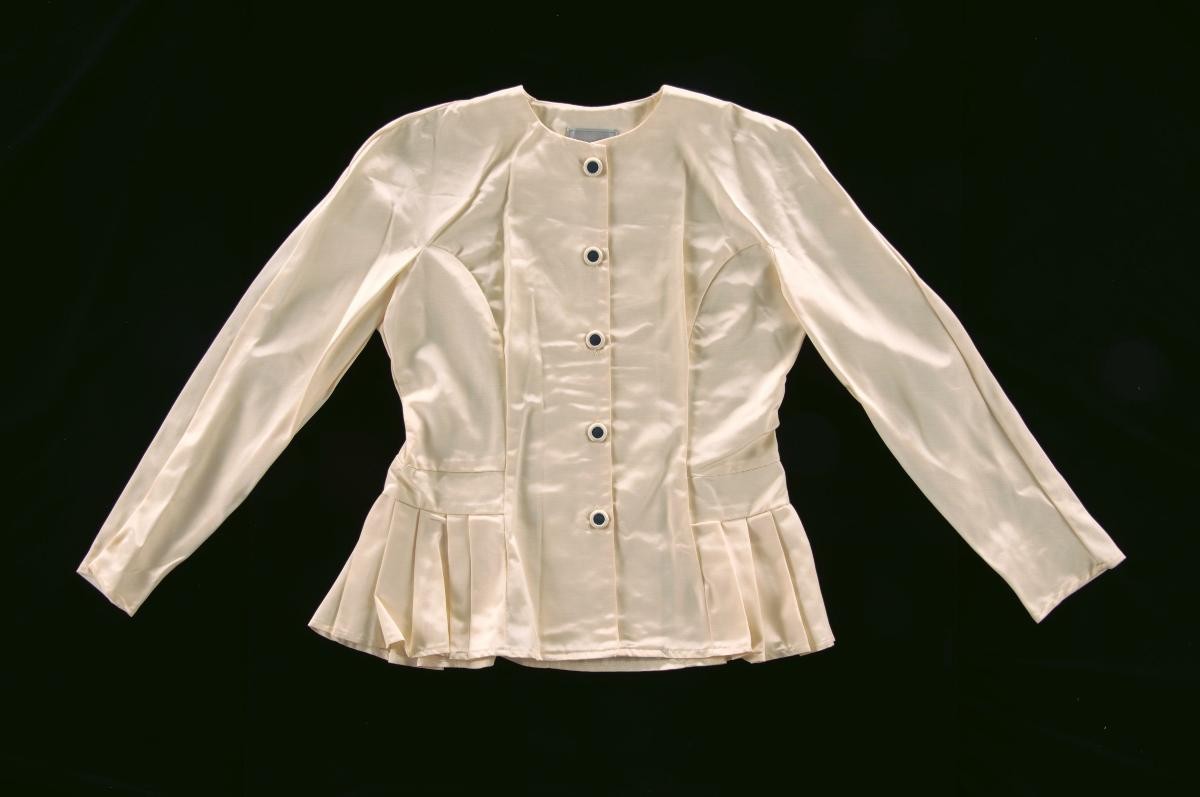 Off-white fitted jacket with pleated peplum by Benny Ong