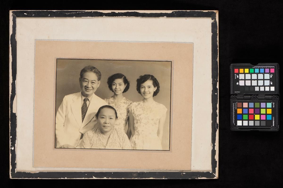 Framed photograph of Low Kway Song and family