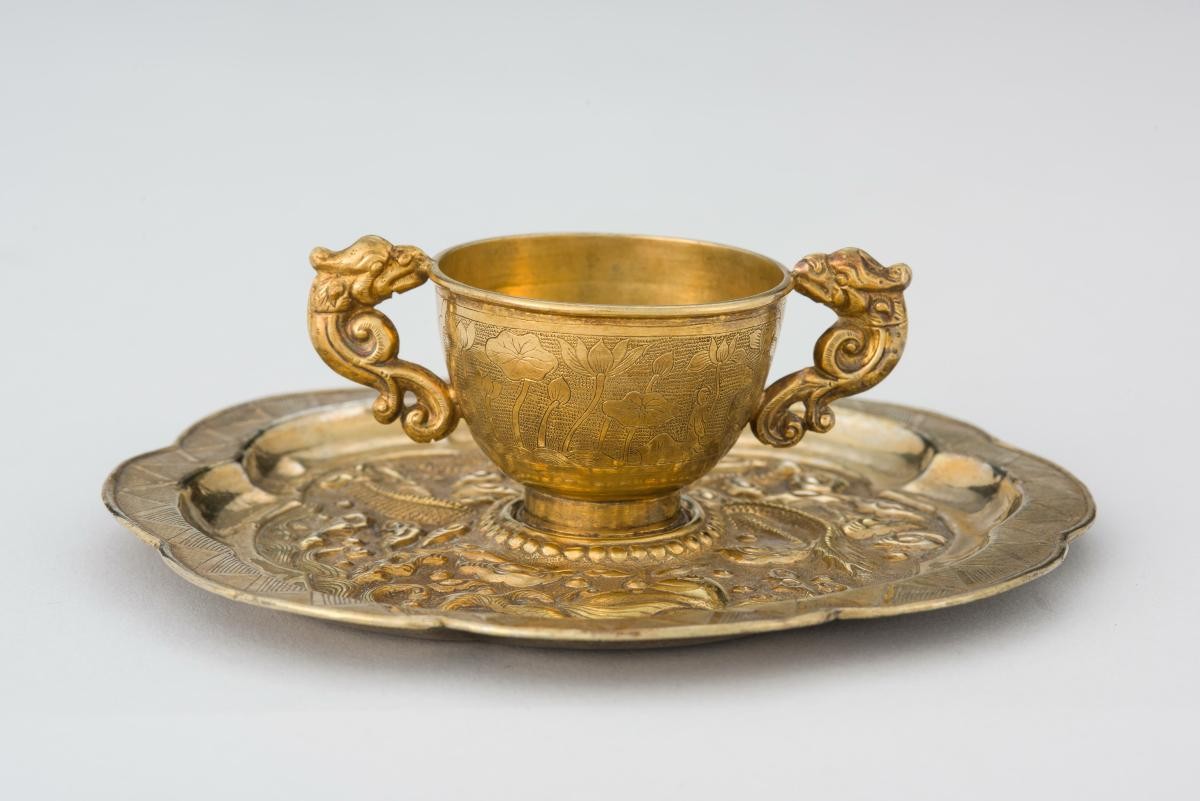 Cup with saucer