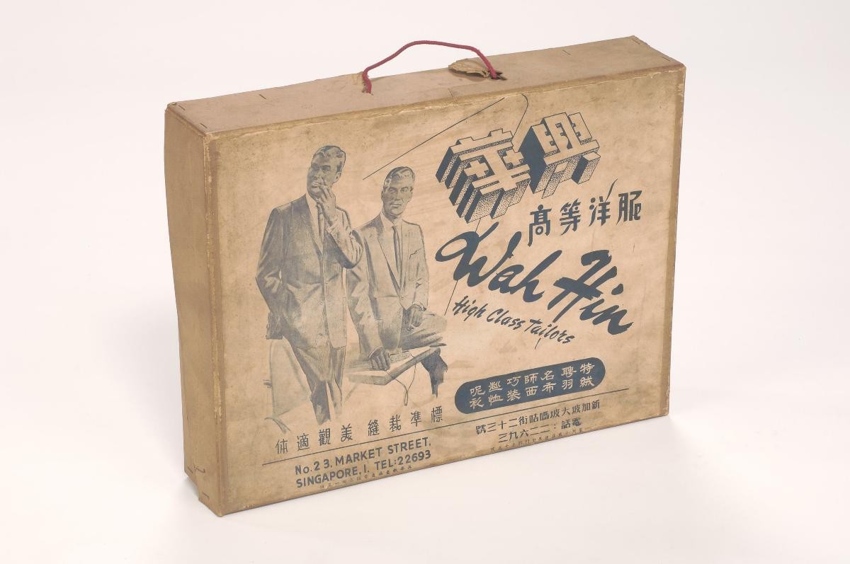 Carrier box with advertisement for Wah Hin Tailors