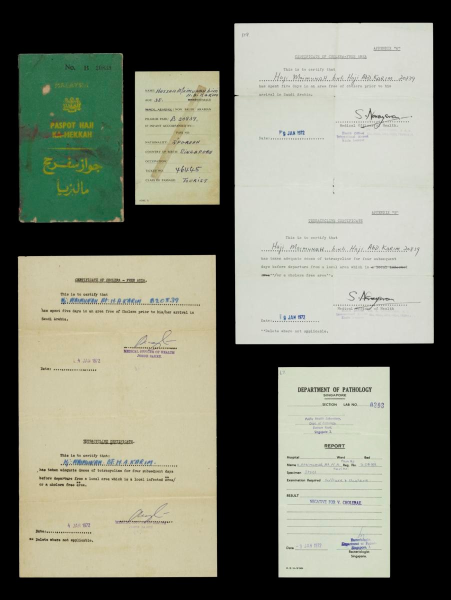 Pilgrim pass belonging to Hajjah Maimunah binti Haji Abdul Karim, Singapore’s first licensed female sheikh haji (light green cover)