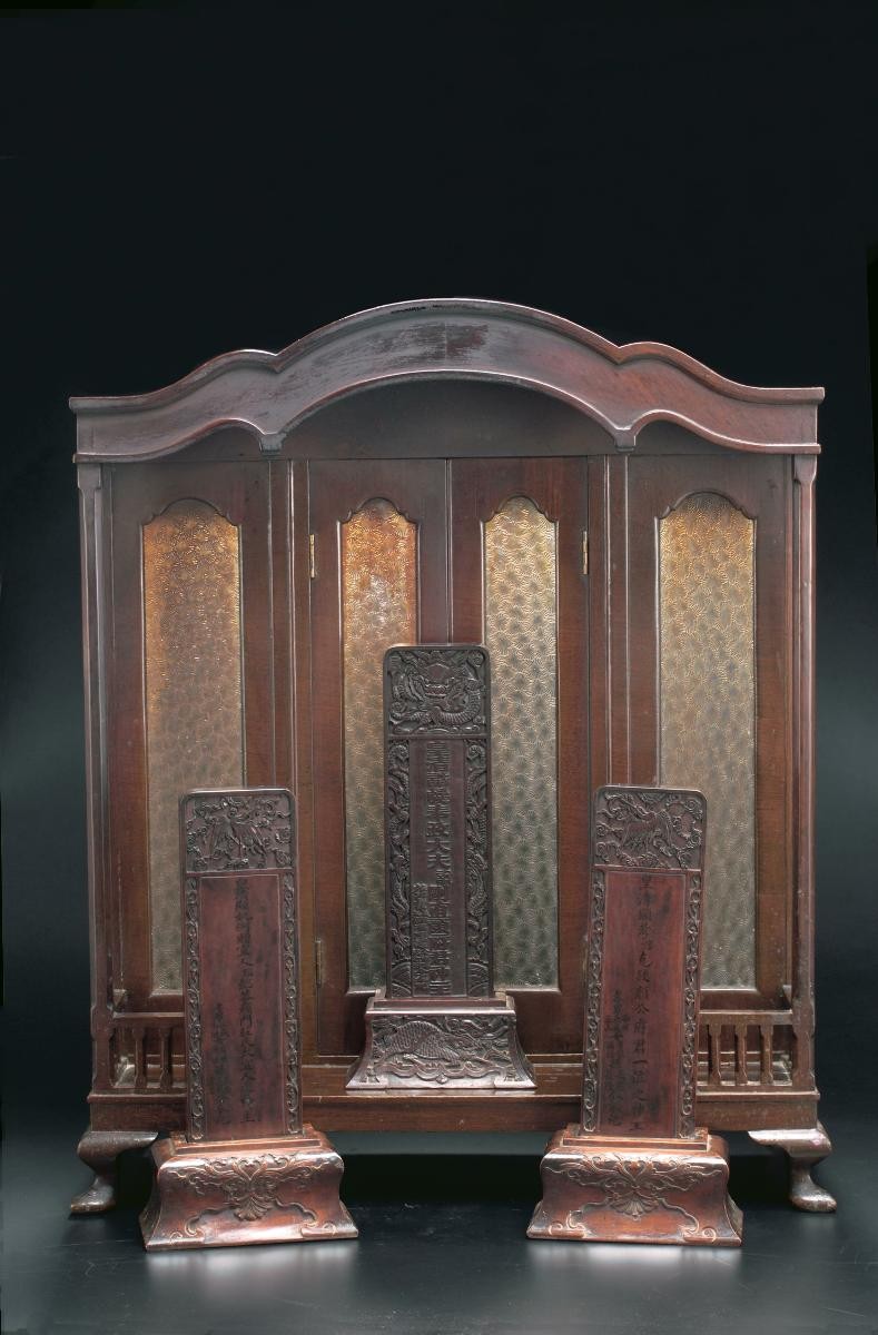 Group of ancestral tablets and spirit house