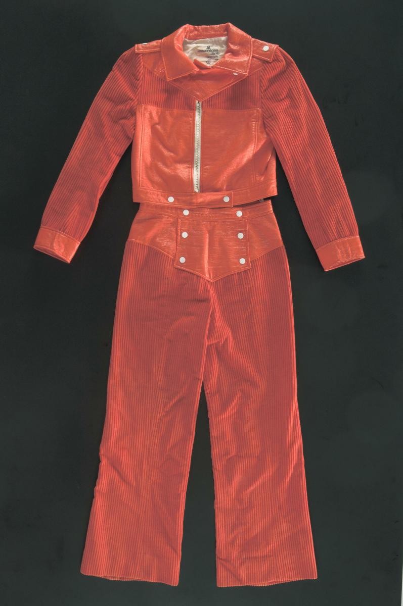 An orange André Courrèges Hyperbole suit