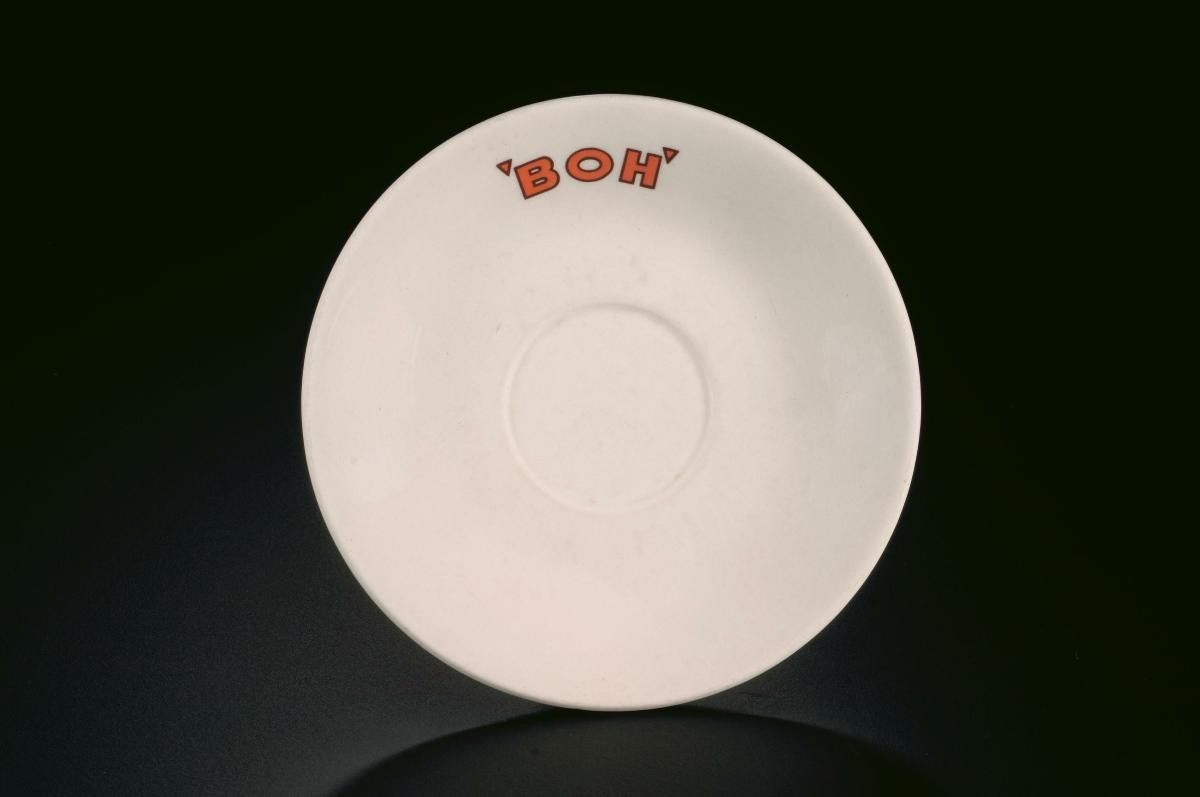 White porcelain saucer with Boh logo