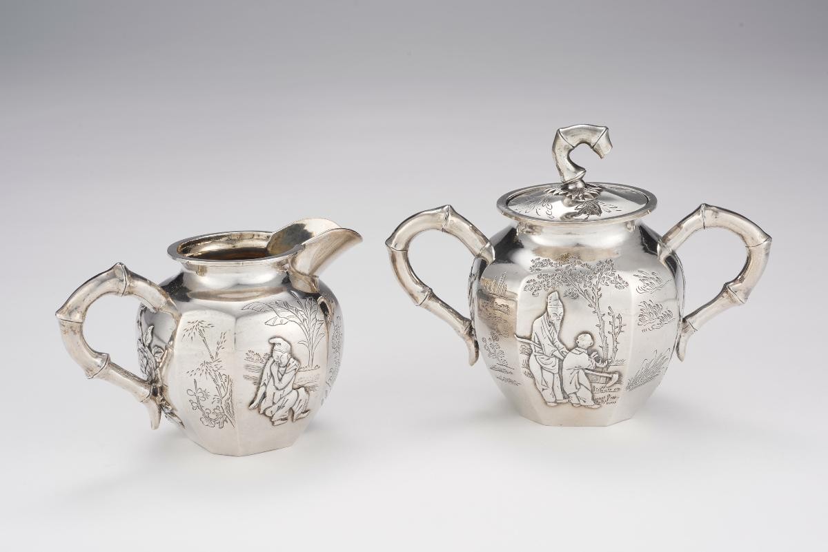 A 2-piece Chinese export silver tea set