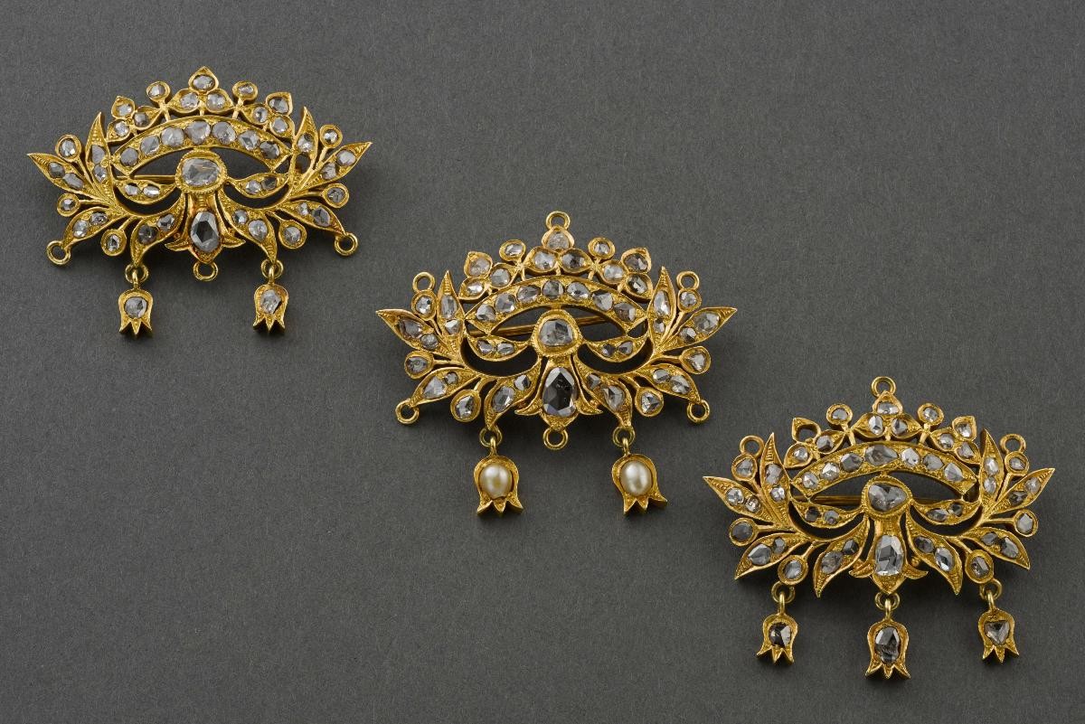 A set of coronet brooches set with pearls and rose-cut diamonds