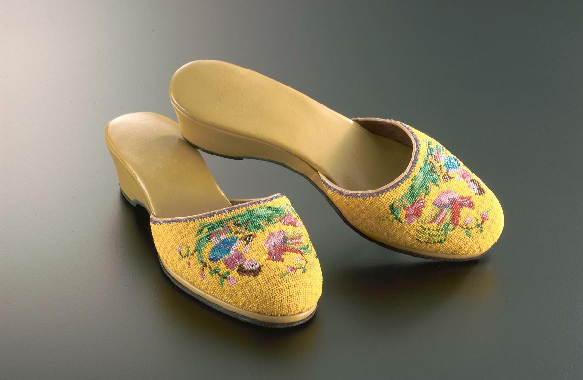 A pair of beaded slippers